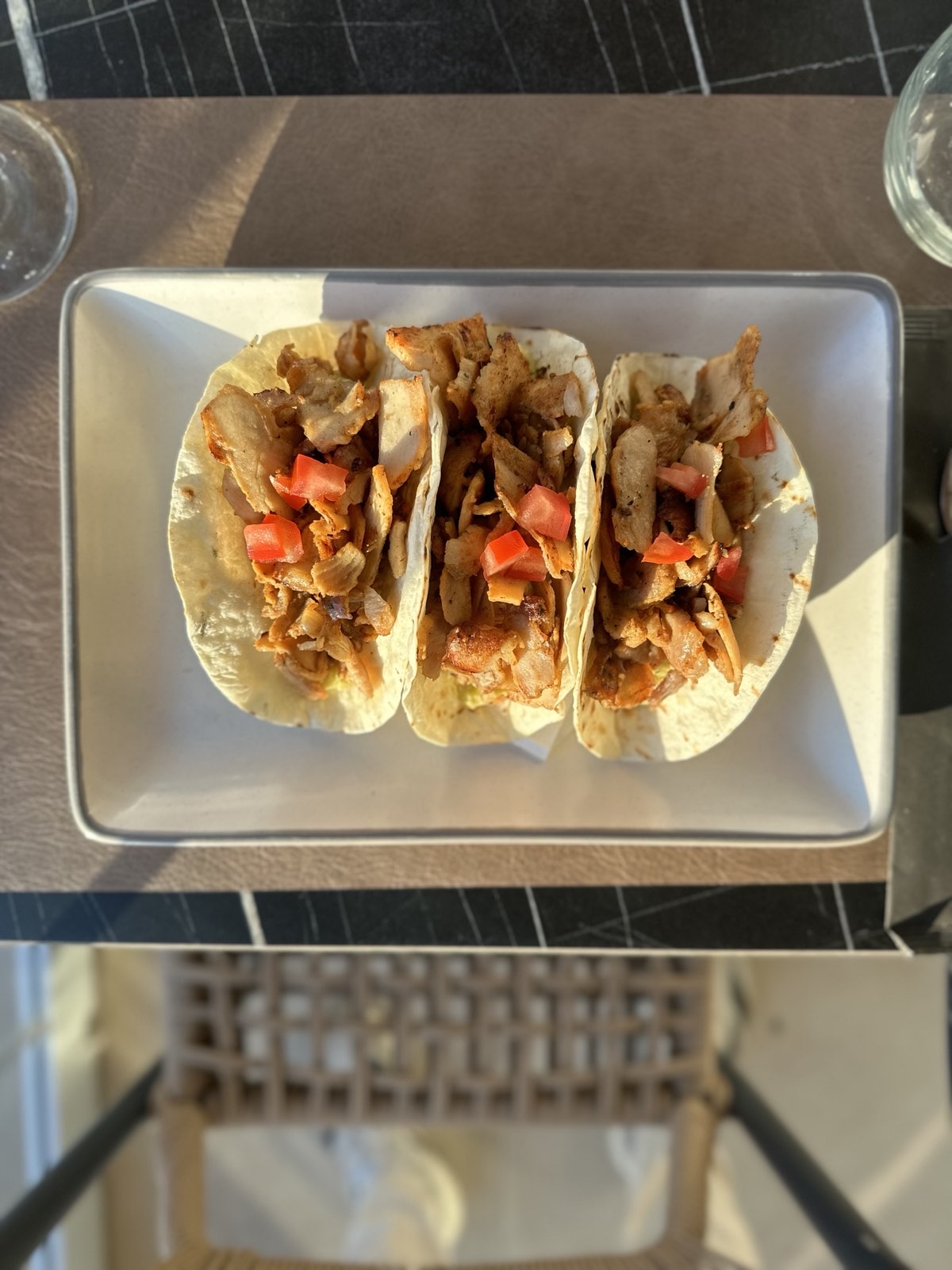 Chicken tacos with fresh tomatoes at Tramonto Lounge
